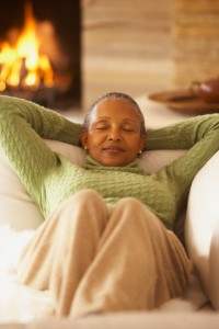 Senior woman relaxing on the sofa, Richmond, Virginia, United States