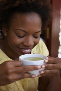 Woman enjoying cup of tea