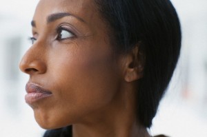 Profile of pretty, mid-adult woman.