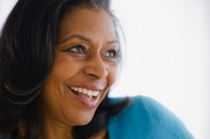 Smiling mixed race woman