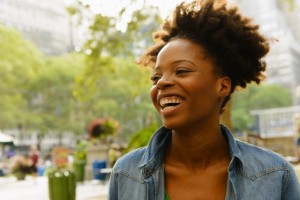 Close up of woman with wide toothy smile