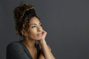 Portrait of woman with curly hair