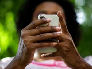 black-women-holding-phone-ap-2017