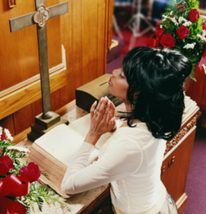 00black-woman-in-church_exc