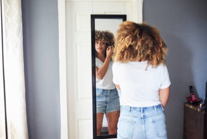 black woman in mirror