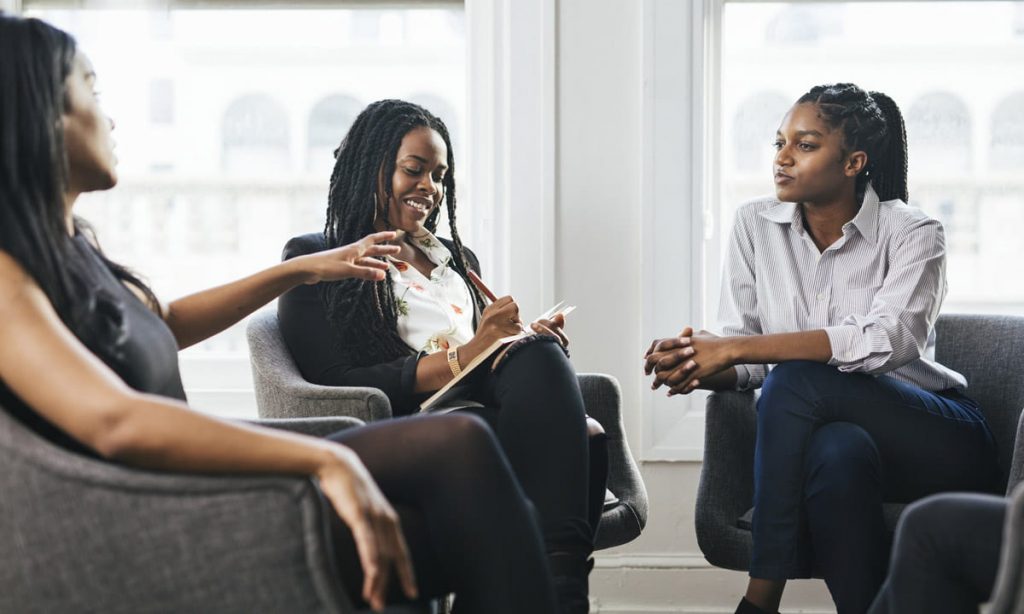 group of black women talking