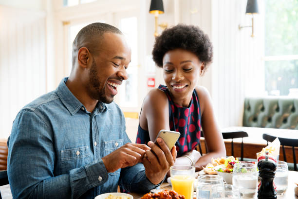 Black Man and Black Woman Talking On Date.